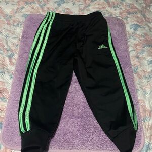 Adidas Kids Black Joggers with Green Stripes